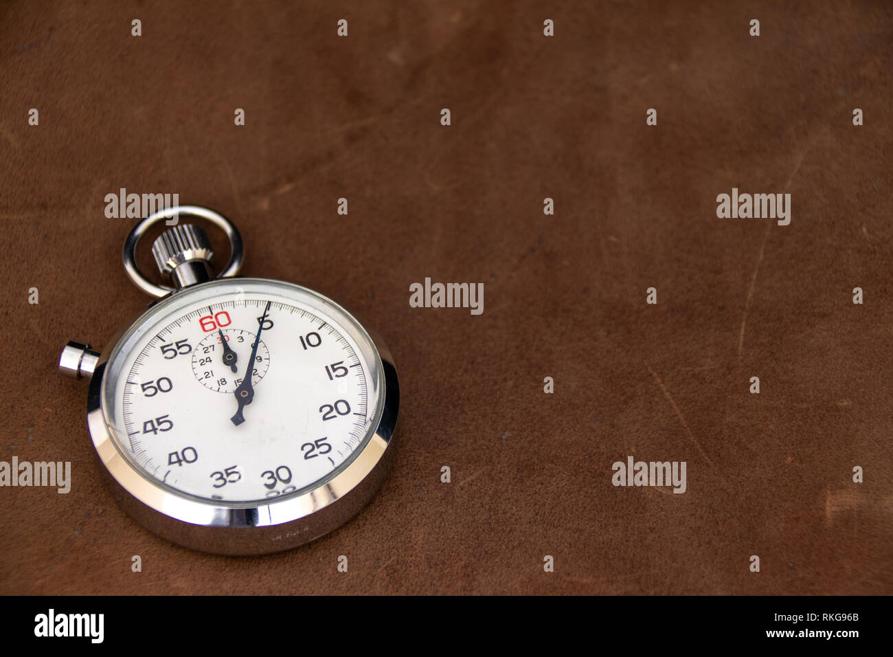 Stopwatch on leather background Stock Photo
