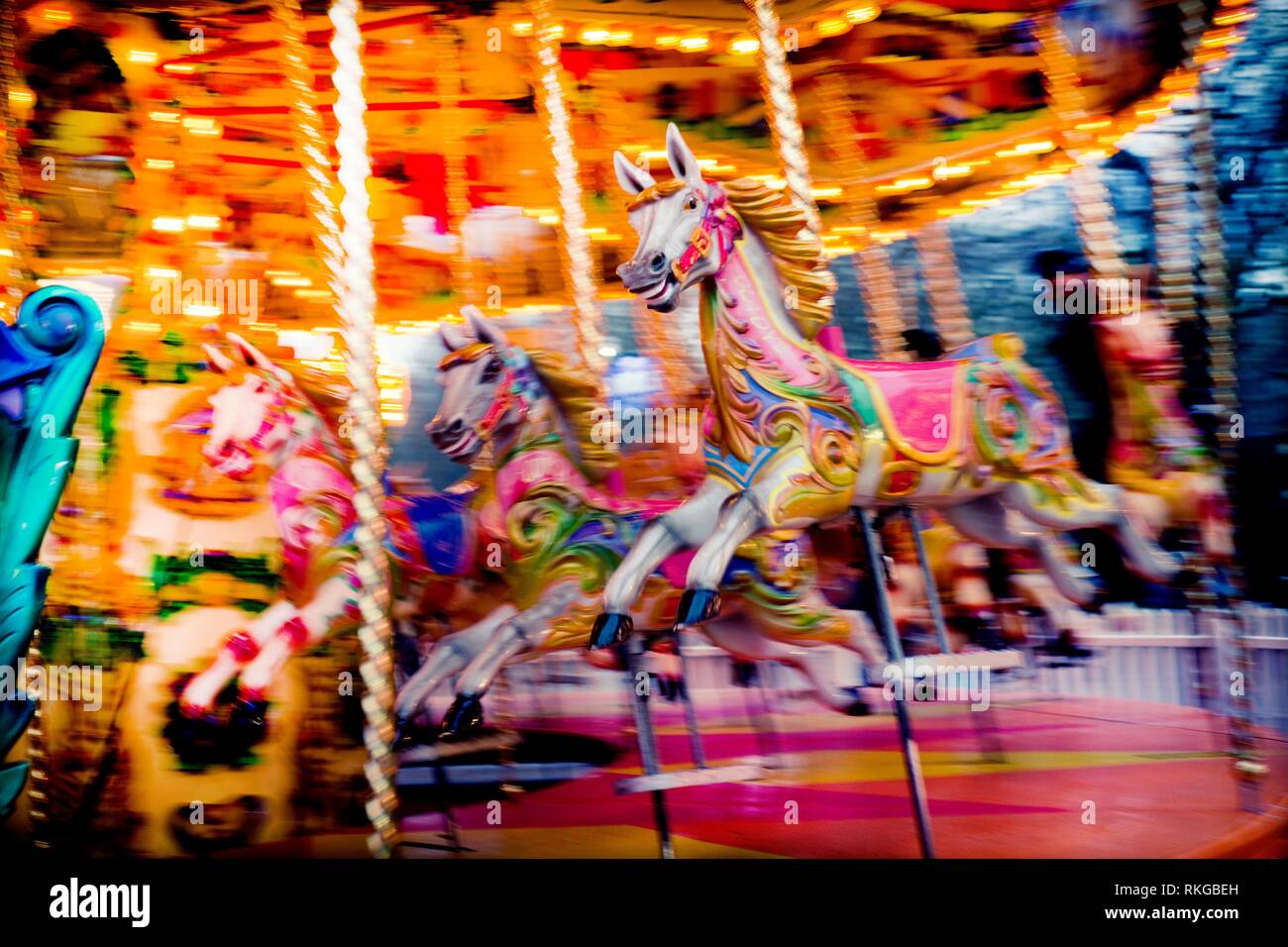 Horses on a fairground carousel at Winter Wonderland in Hyde Park. Hyde Park, London, England Horses on a fairground carousel at Winter Wonderland in Hyde Park. Hyde Park, London, England
