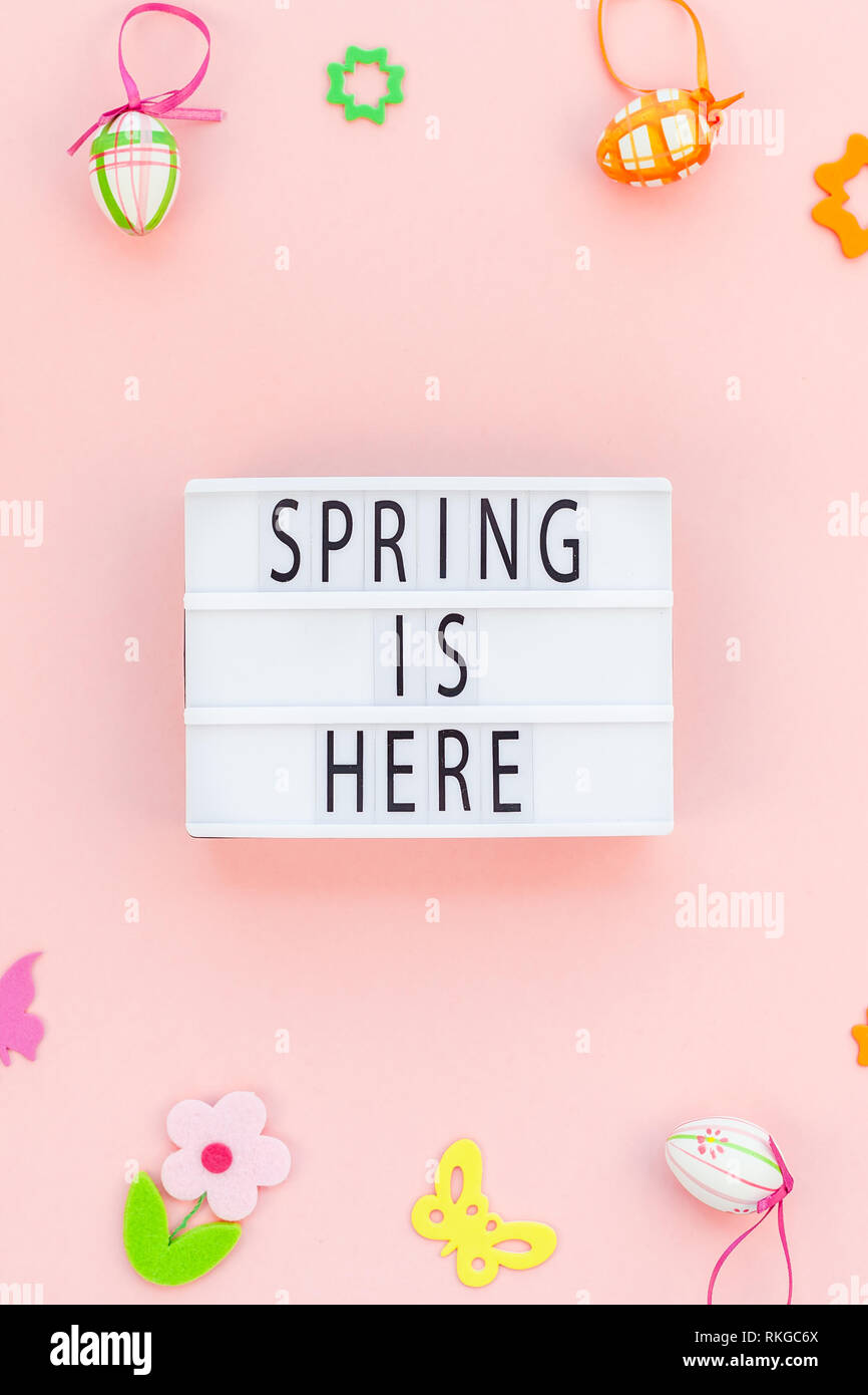 Creative Top view flat lay holiday composition Easter text Spring is ...