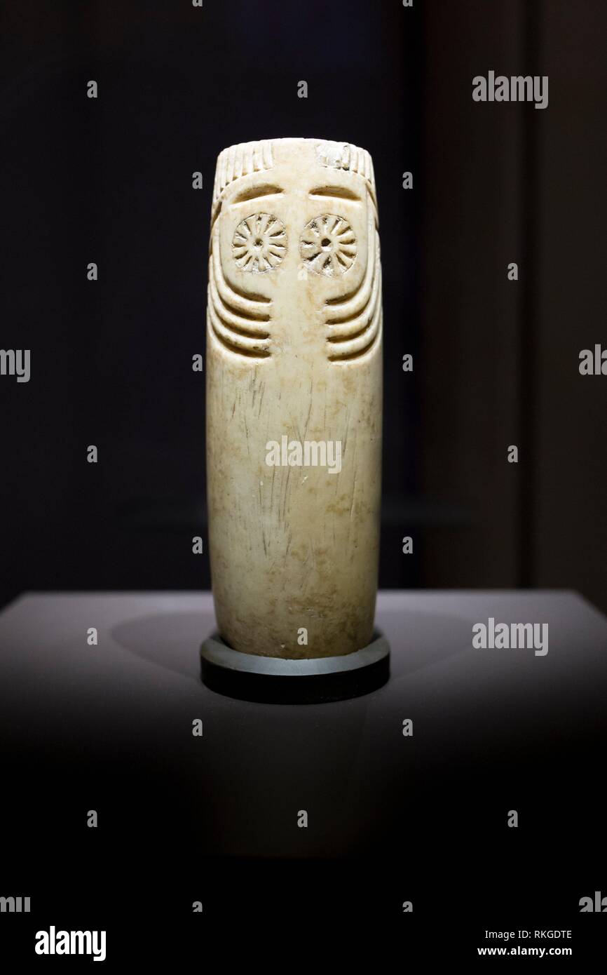Madrid, Spain: Cylindrical alabaster idol with face depicted. Front view. National Archeological Museum, Madrid. Stock Photo
