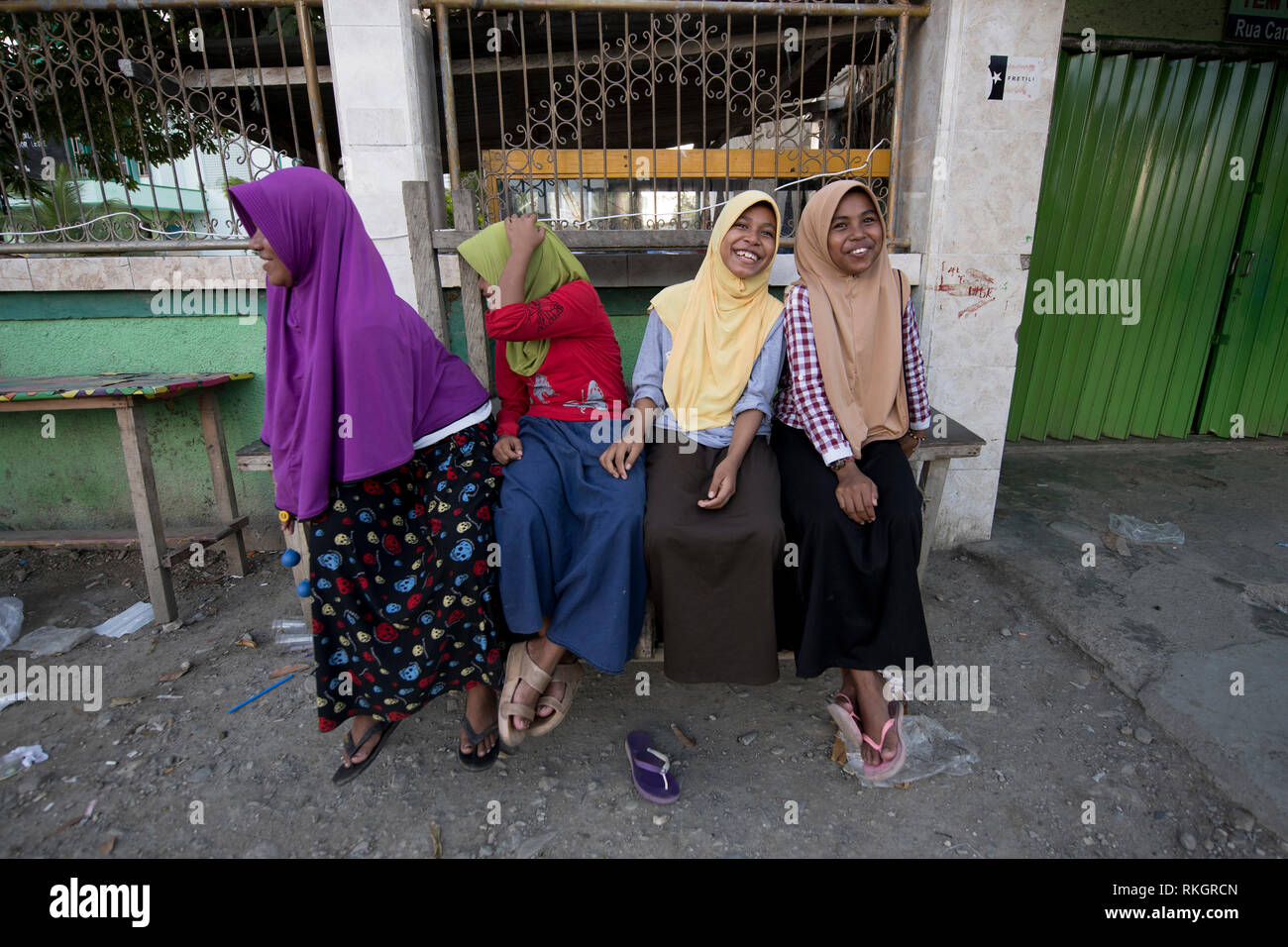 Moslem girls, Laughing Muslim girls wearing hijabs, Dili, East Timor