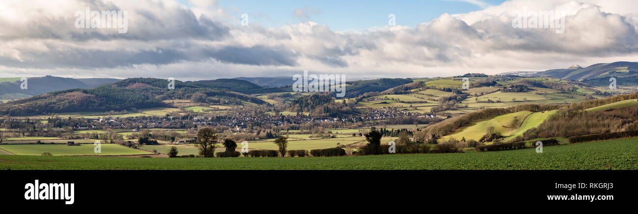 Presteigne, Powys, UK. Panoramic view of mid-Wales, with the Radnorshire landscape surrounding this old county town and the ruins of Stapleton Castle Stock Photo
