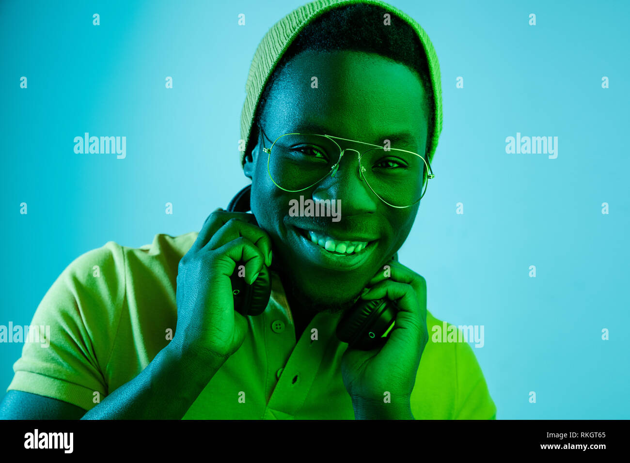 Close up portrait of a happy young african american man smiling on ...