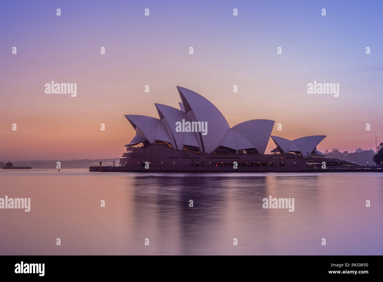 Sydney, Australia - January 6, 2019: sydney opera house at sunrise. This building is one of the 20th century's most famous and distinctive buildings. Stock Photo