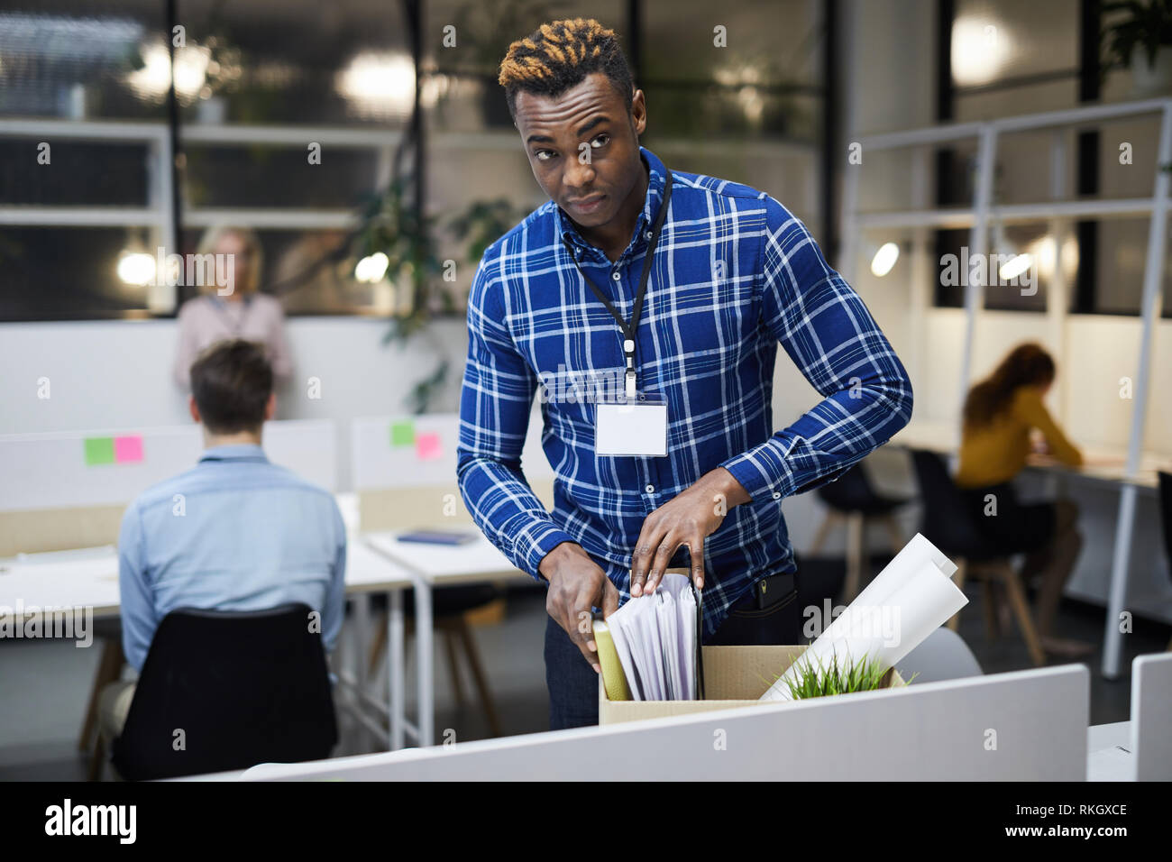 Black man discharged from place of employment Stock Photo