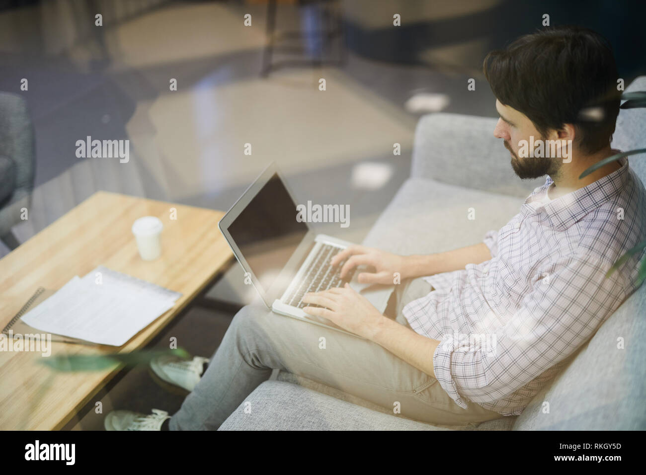 Modern man working remotely Stock Photo
