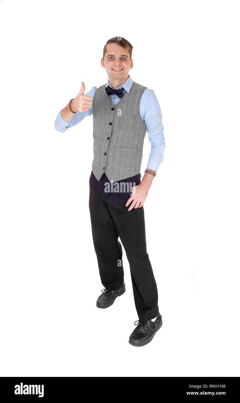 An image of a young happy man smiling and showing his thump up agreeing with the dissishion, isolated for white background Stock Photo