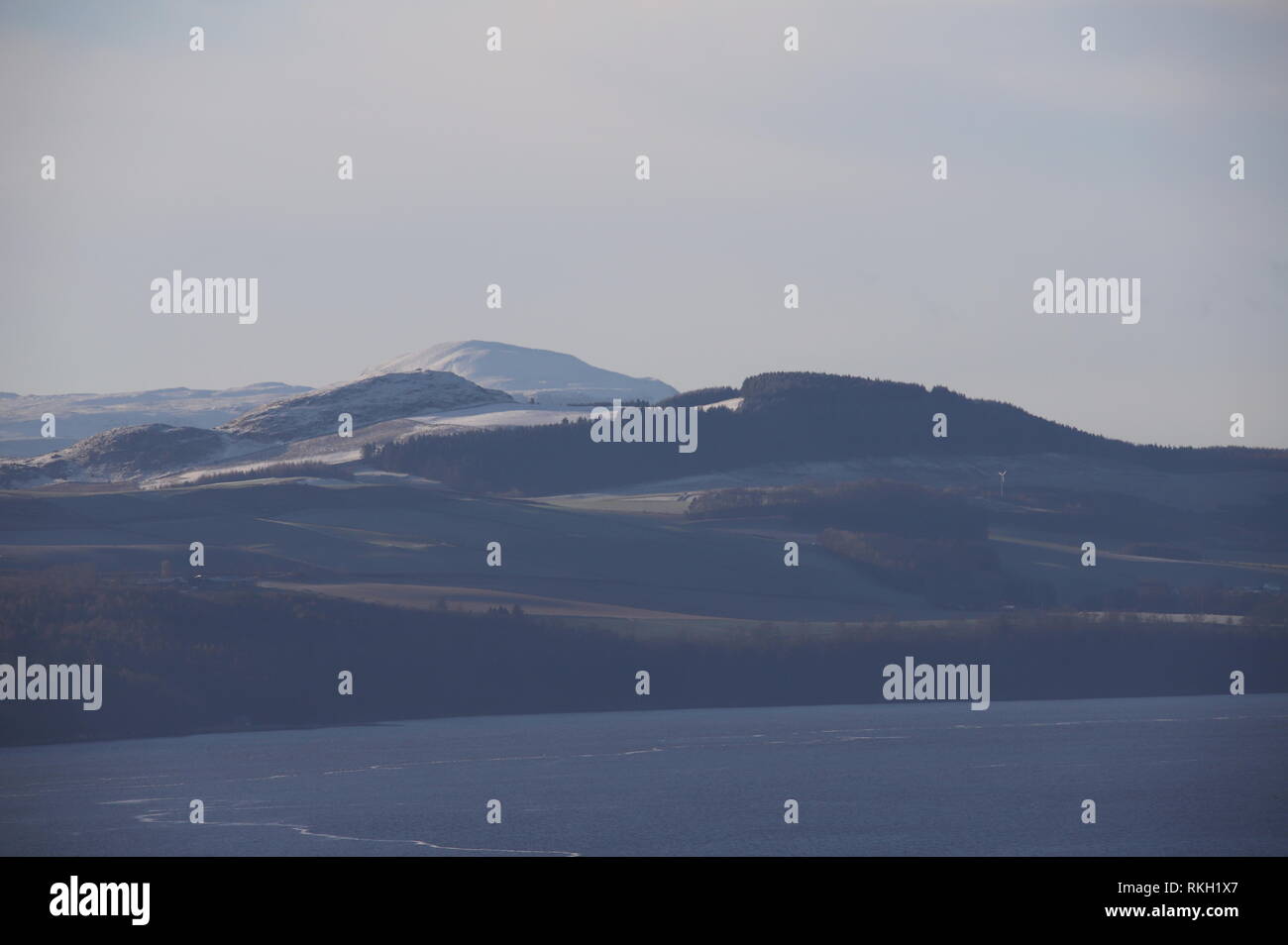 Distant view of Normans Law and snow capped West Lomond Fife Scotland  January 2019 Stock Photo