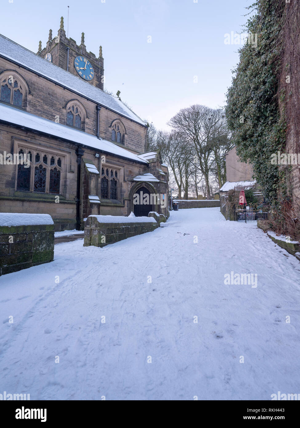 Haworth Church, West Yorkshire, home to the Bronte family, in the snow in winter. Stock Photo
