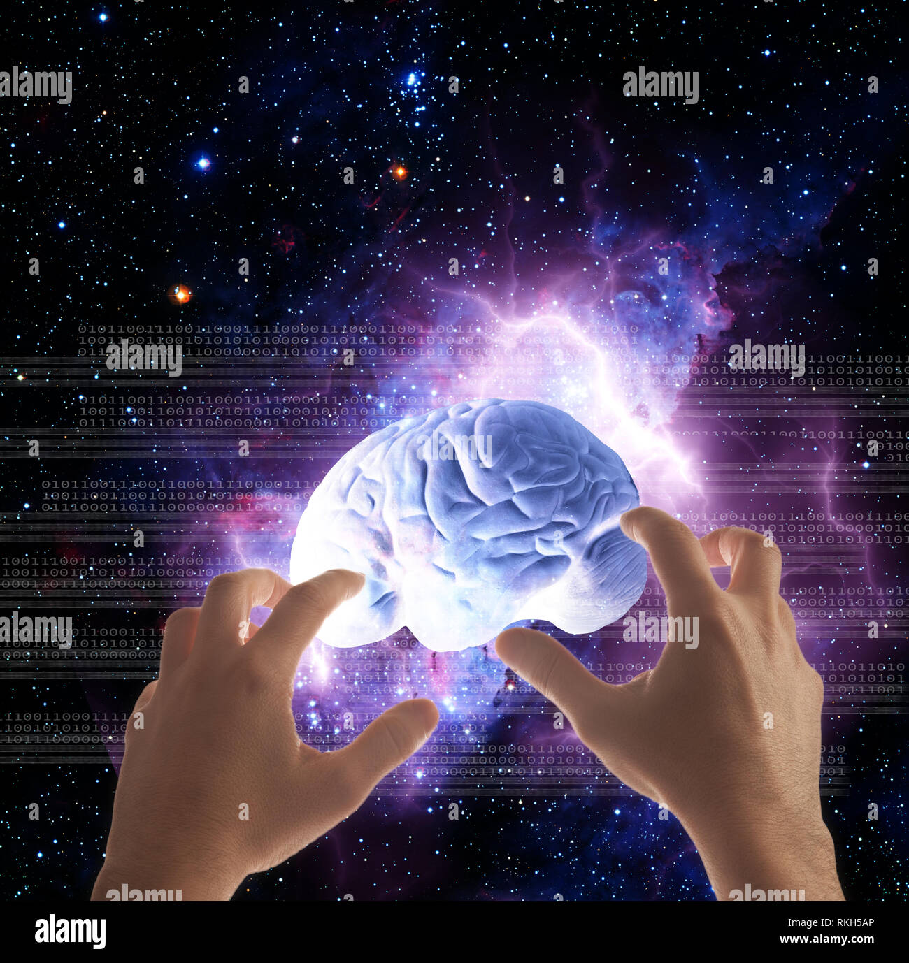 hands grabbing a human brain, over binary digits and universe, concept for science, future of medicine and anatomy, brain manipulation Stock Photo