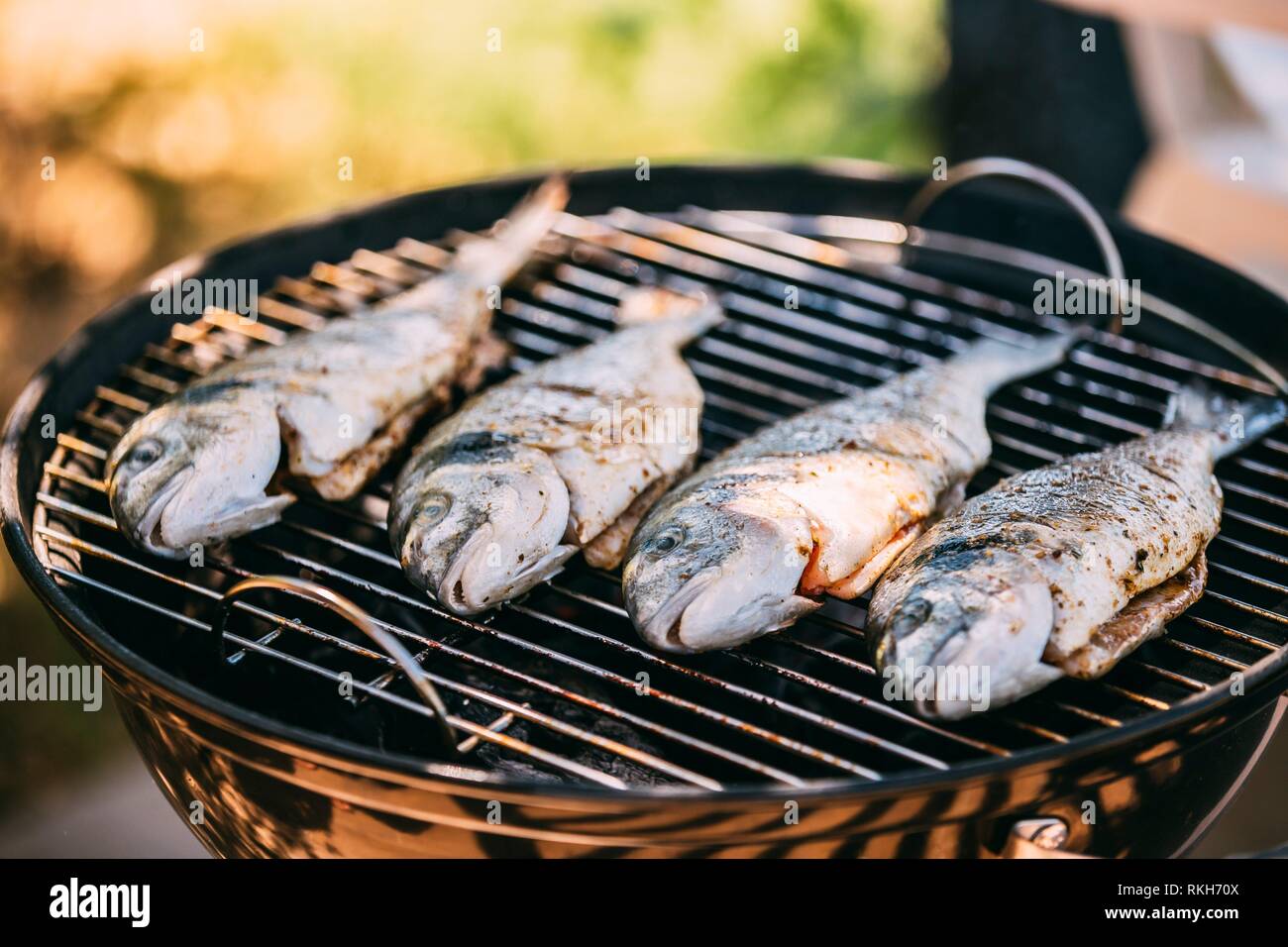 Fish Fried On The Grill Outdoor. Spanish Cuisine Stock Photo Alamy