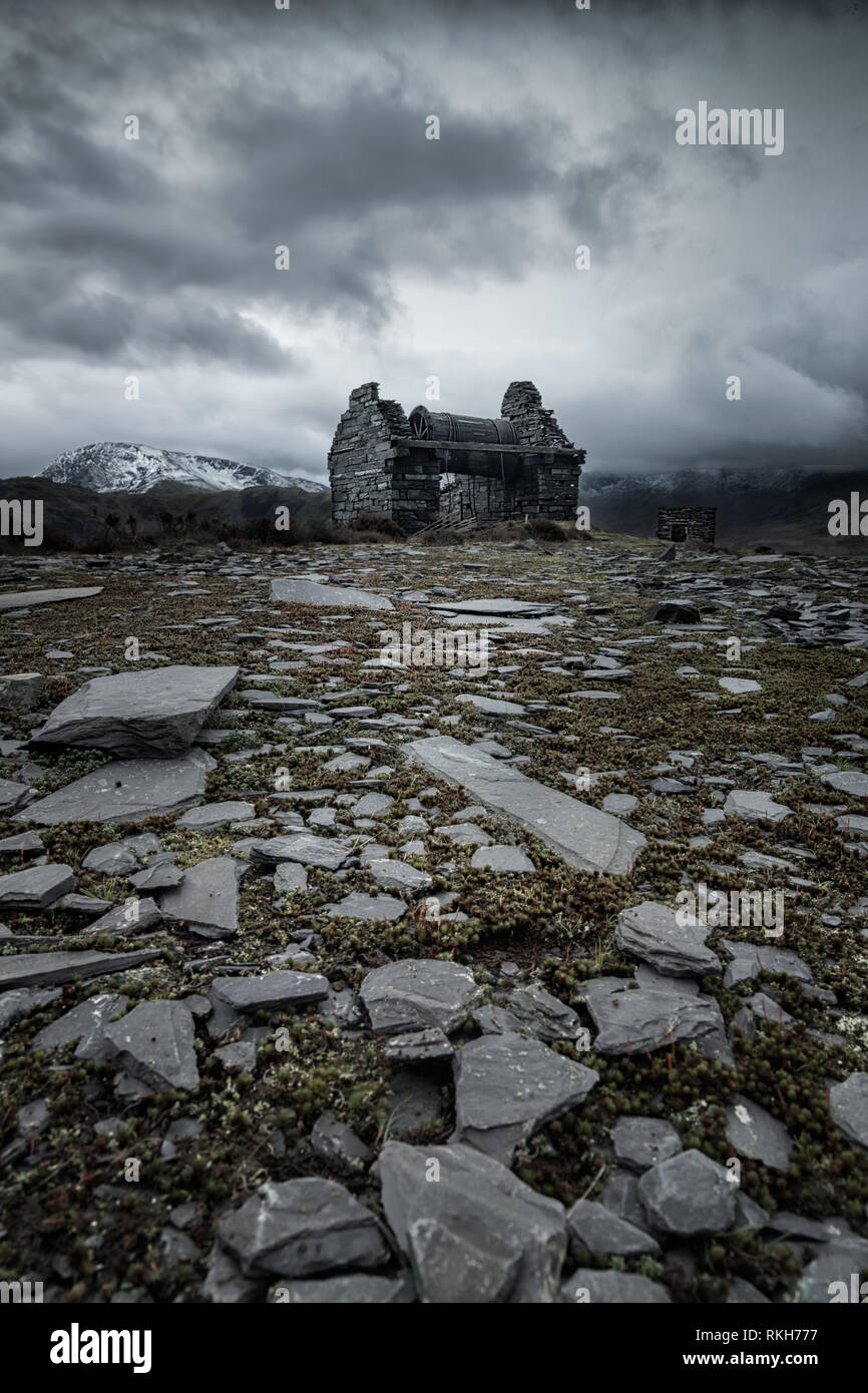A disused building on the Dinorwic Slate Quarry site with moody sky near Llanberis, Snowdonia, Wales, UK Stock Photo