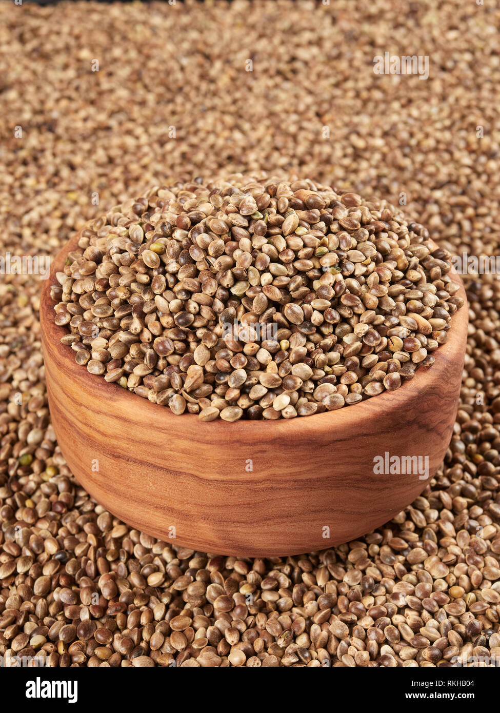 Bowl of hemp seeds. Bird food. Stock Photo