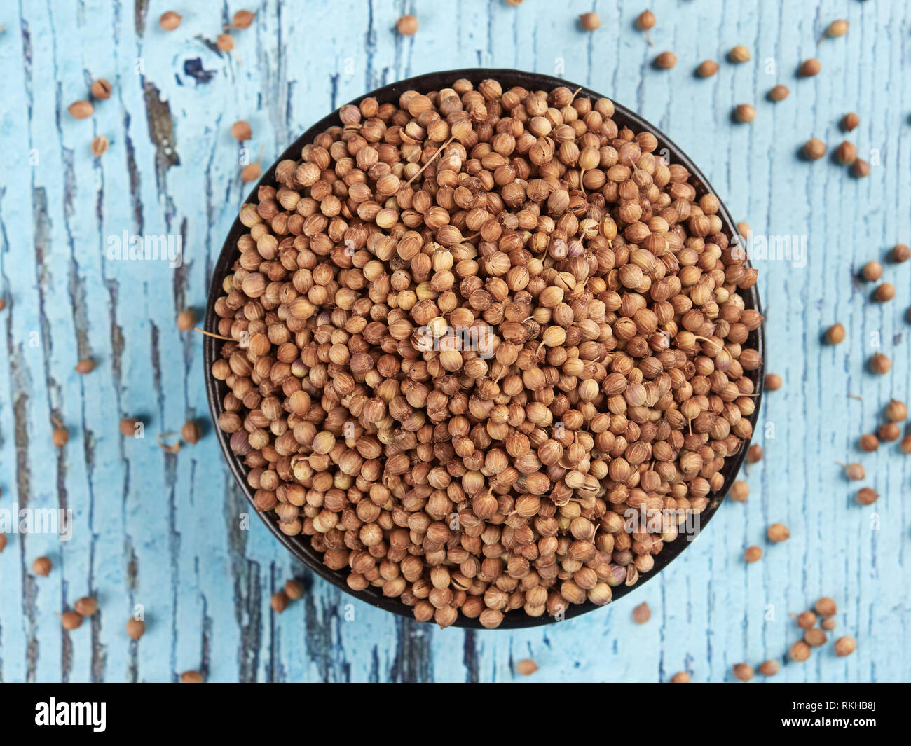 Bowl of coriander seeds Stock Photo