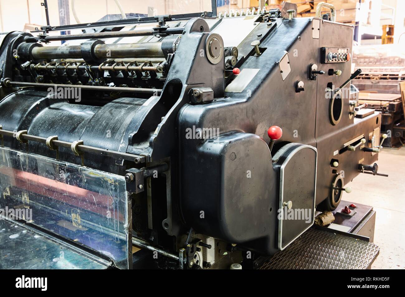 Printer lithography cylinder machine in a printing factory. Stock Photo