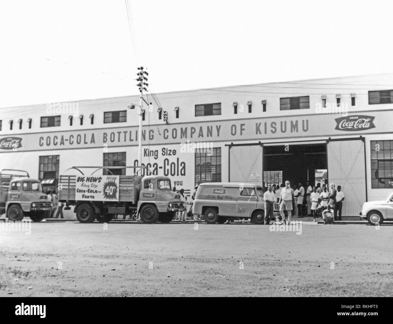 The bottling facility for the Coca-Cola Company in Kisumu c.1960. The plant was established in 1950 at the Kenyan port city on Lake Victoria and was located on the Obote Road. When this plant closed in 1966, Equator Bottlers LTD started operating in a new location. The photograph illustrates that even in the nineteen fifties American soft-drinks brand had a global market Stock Photo