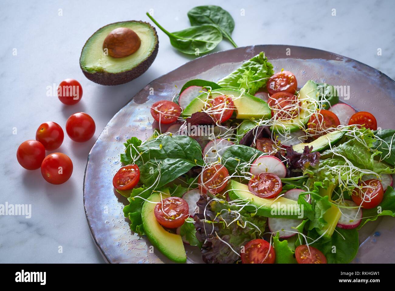 Avocado Salad With Sprouts Tomatoes Spinach And Radish Healthy Food Stock Photo Alamy