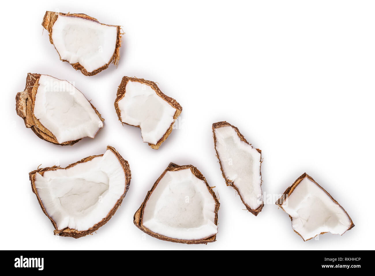 piece of coconut isolated on white background with copy space for your text. Top view. Flat lay Stock Photo