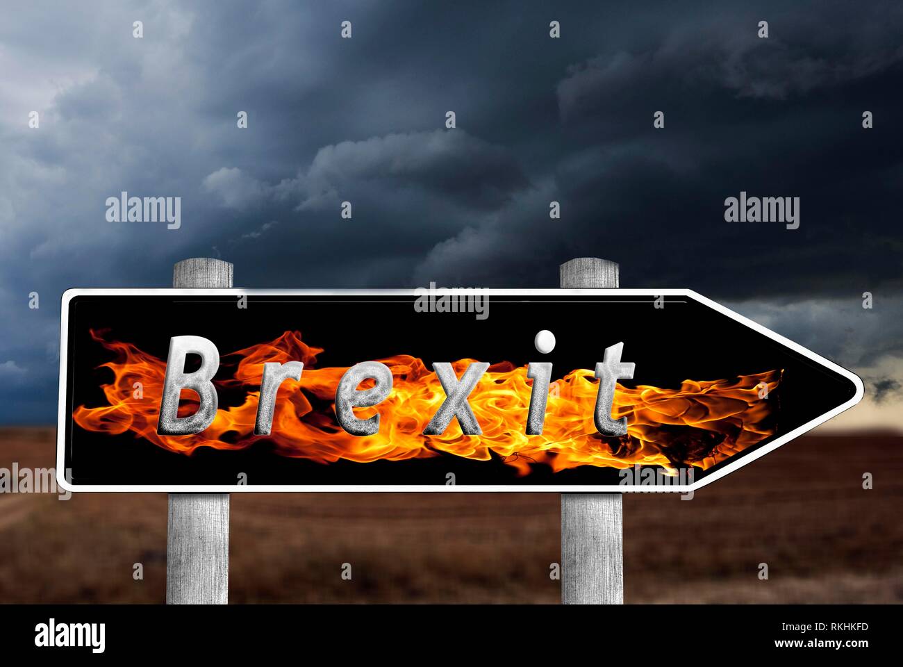 Signpost with flames and lettering Brexit, threatening, thunderstorm atmosphere, symbolic picture leaving EU, Great Britain Stock Photo