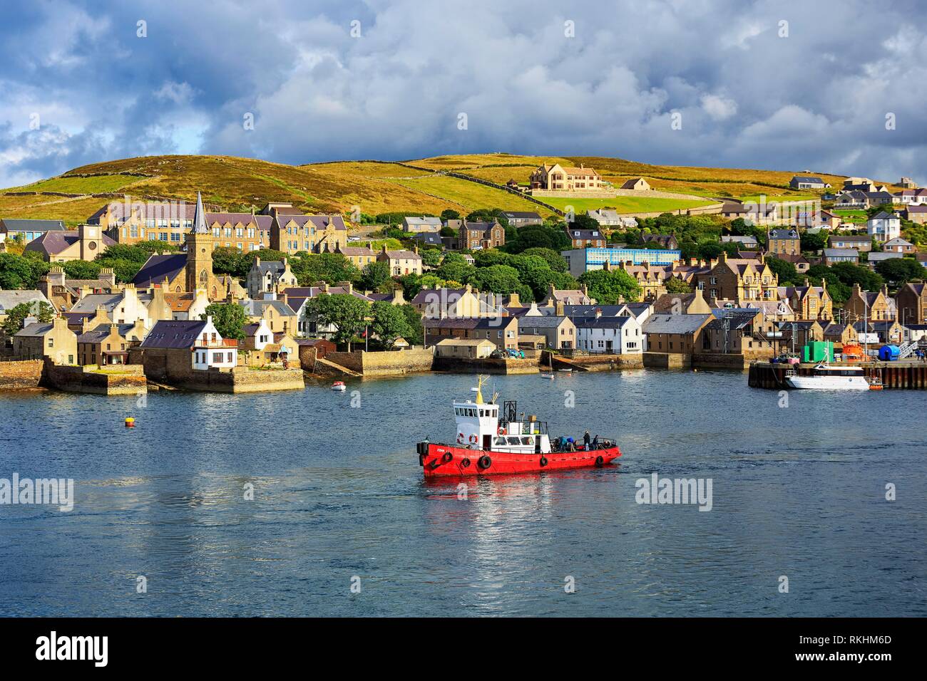 Boat off the seaport of Stromness, Mainland, Orkney Islands, Scotland, Great Britain Stock Photo