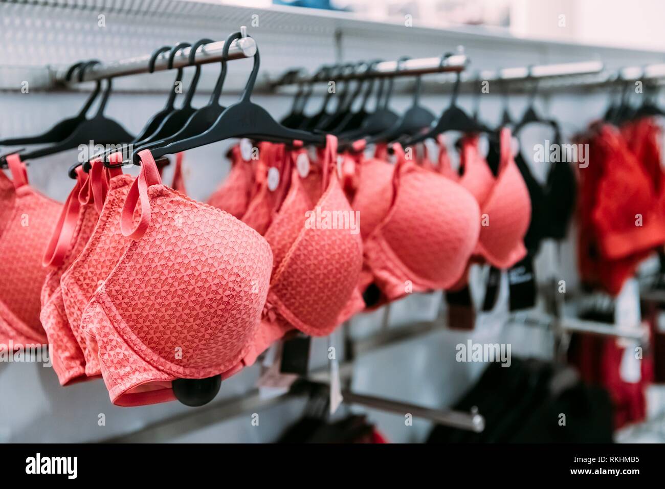 Female Woman Pink Bra Brassiere On Hanger In Store Of Shopping Center Stock  Photo - Alamy
