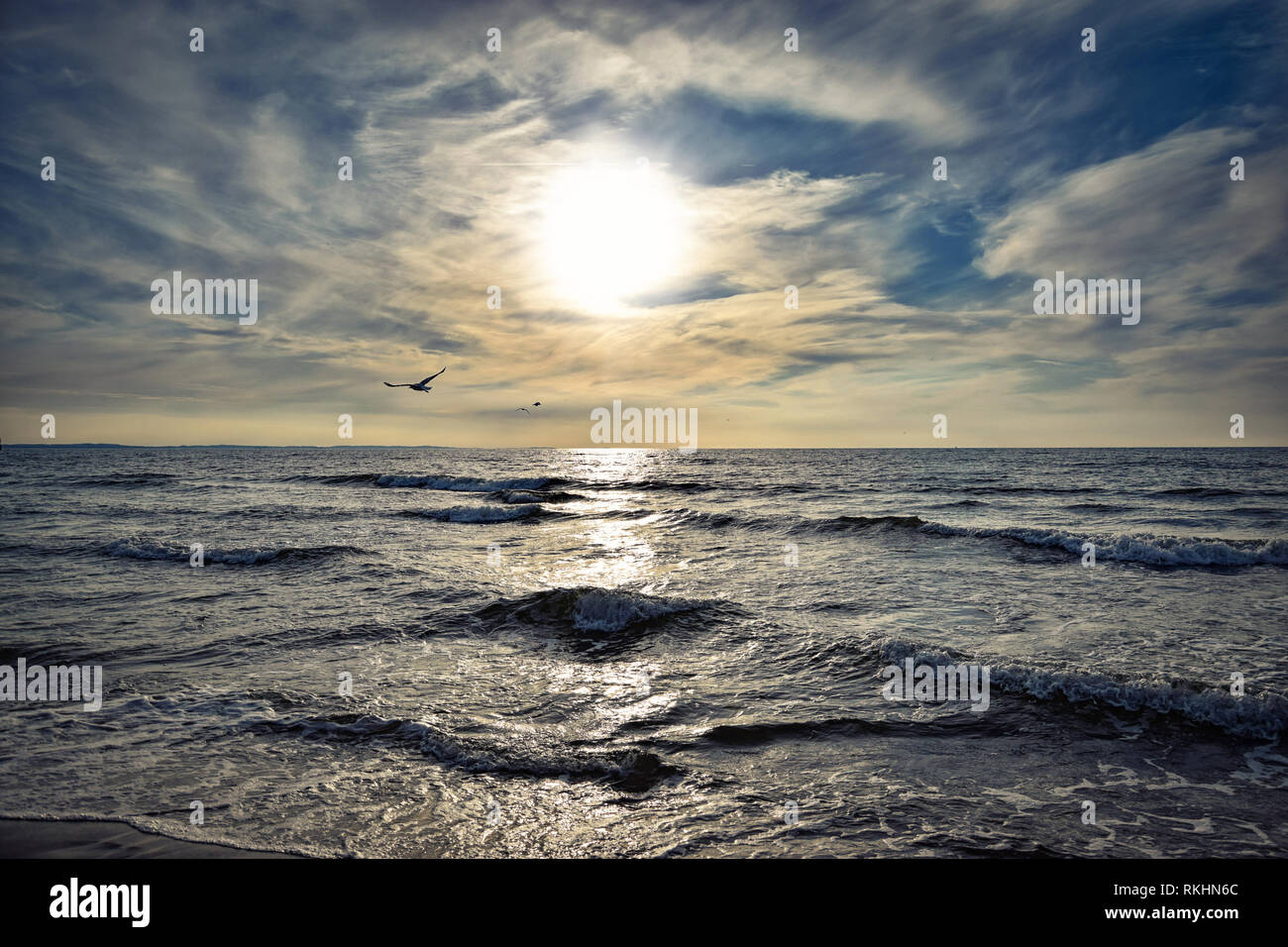 Harbor sea cloudy sky sunset sky hi-res stock photography and images ...