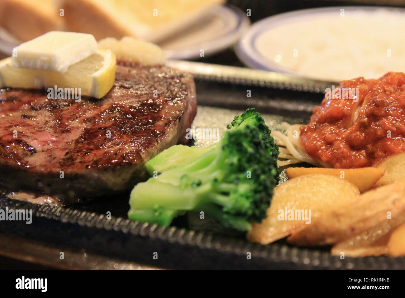 grilled beef sirloin steak with side dishes Stock Photo Alamy