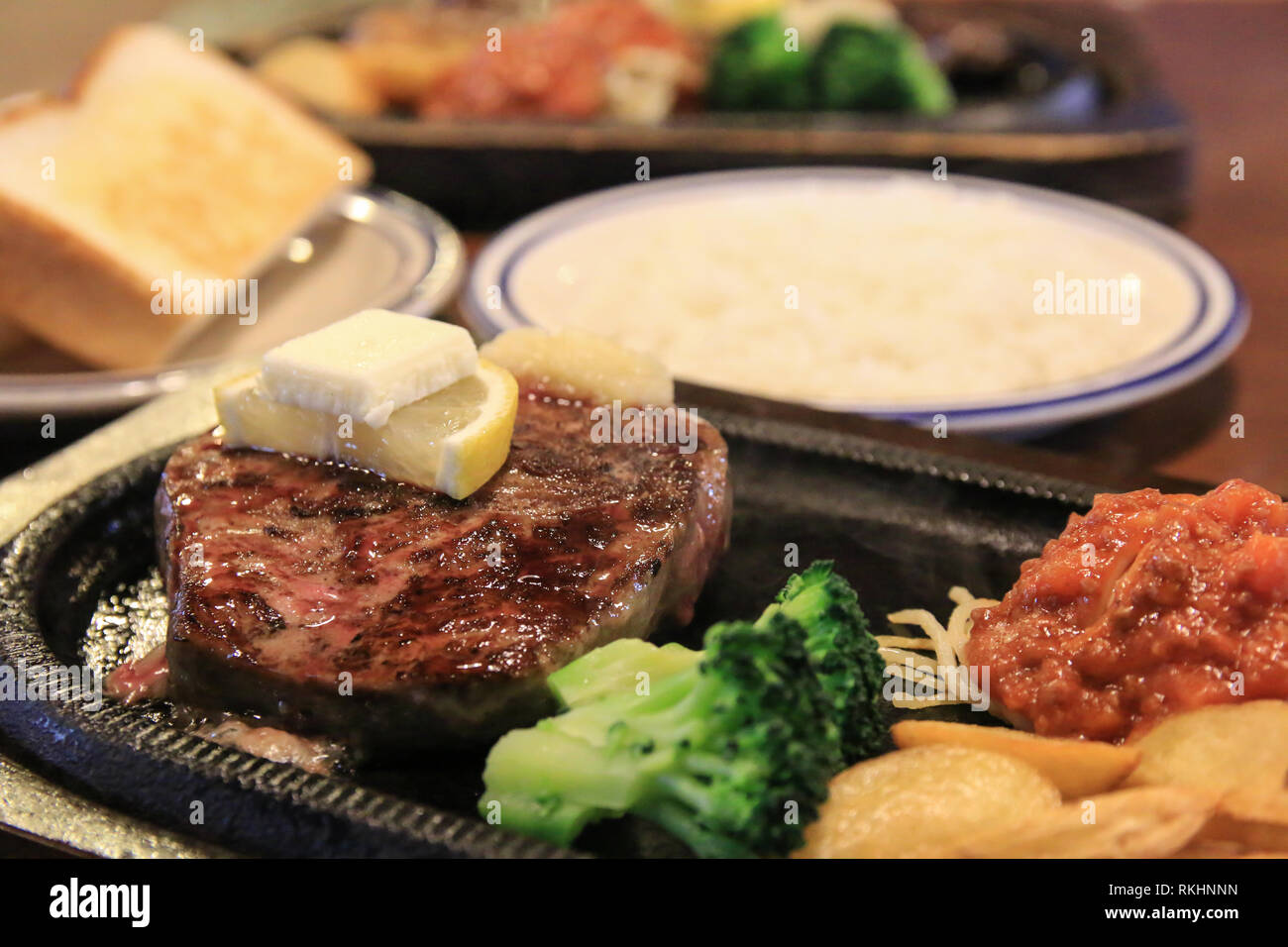 grilled beef sirloin steak with side dishes Stock Photo: 235803505 ...