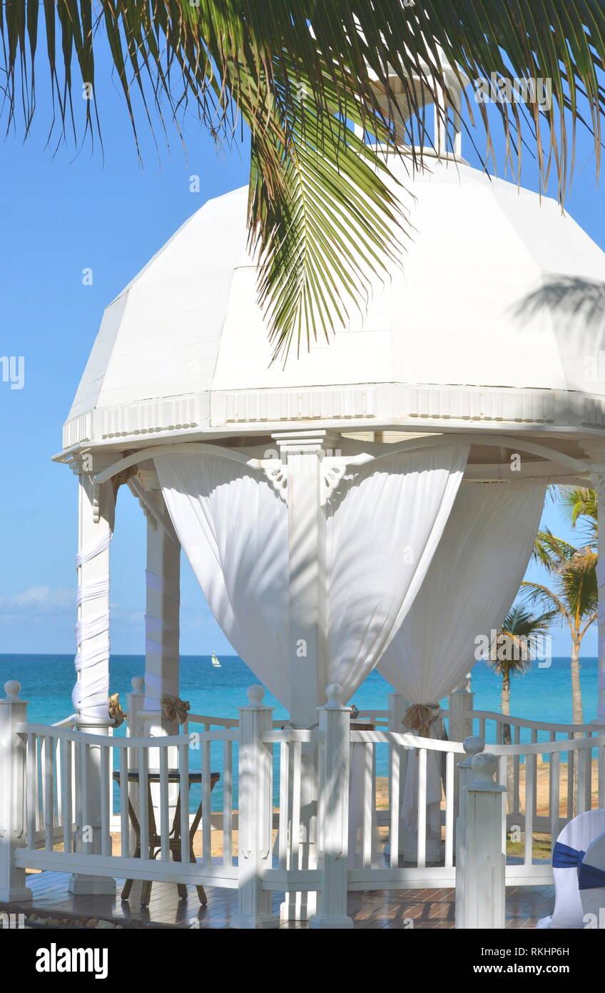 White Wedding Gazebo In A Seaside Tropical Garden At A Destination