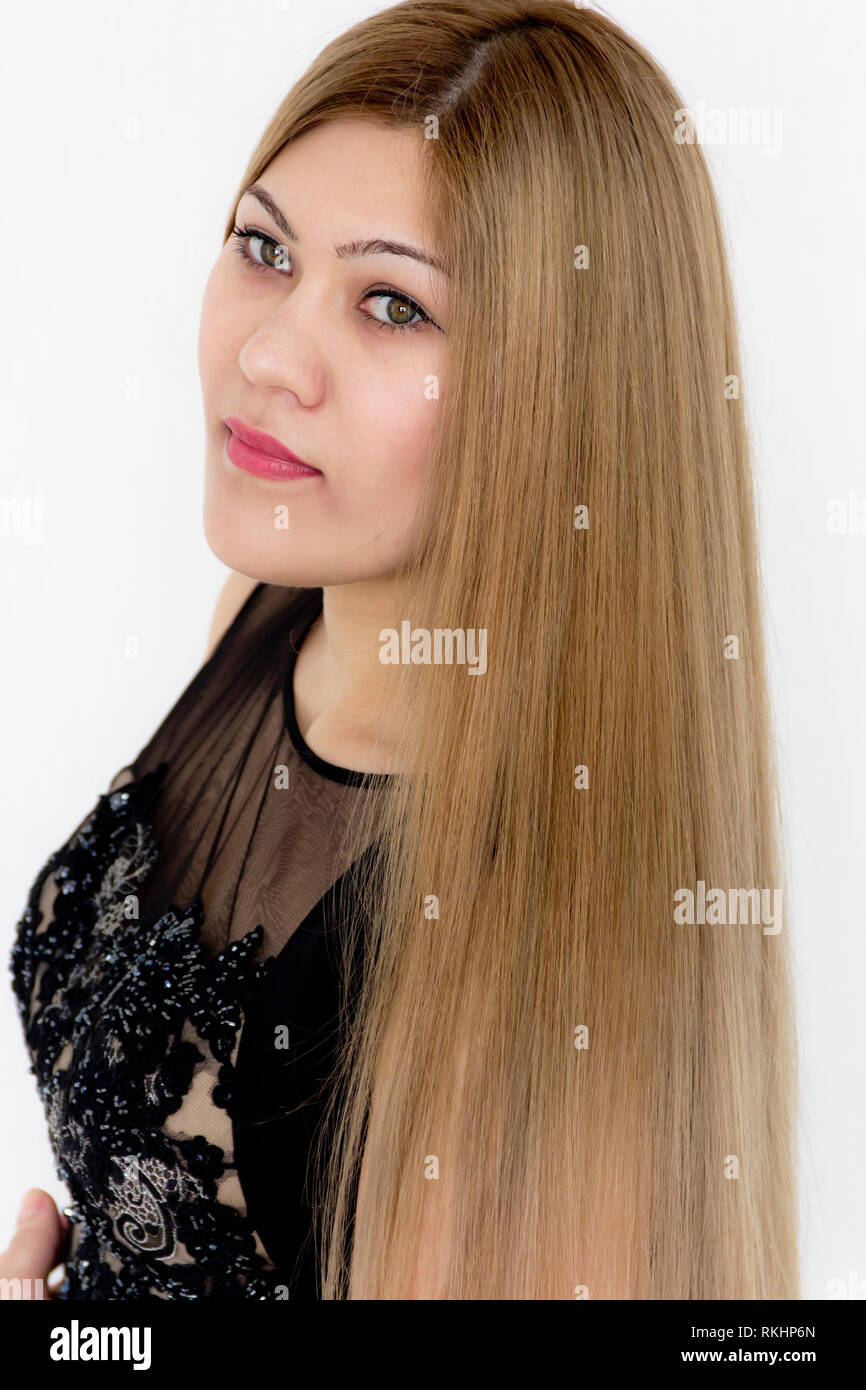 Attractive Young Girl With Brown Healthy Straight Hair In Evening