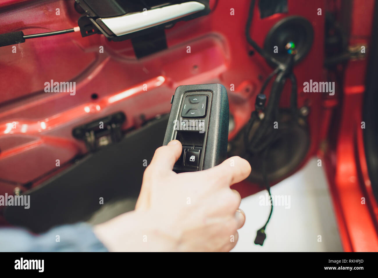 Mechanic installing car central door lock motor Stock Photo Alamy
