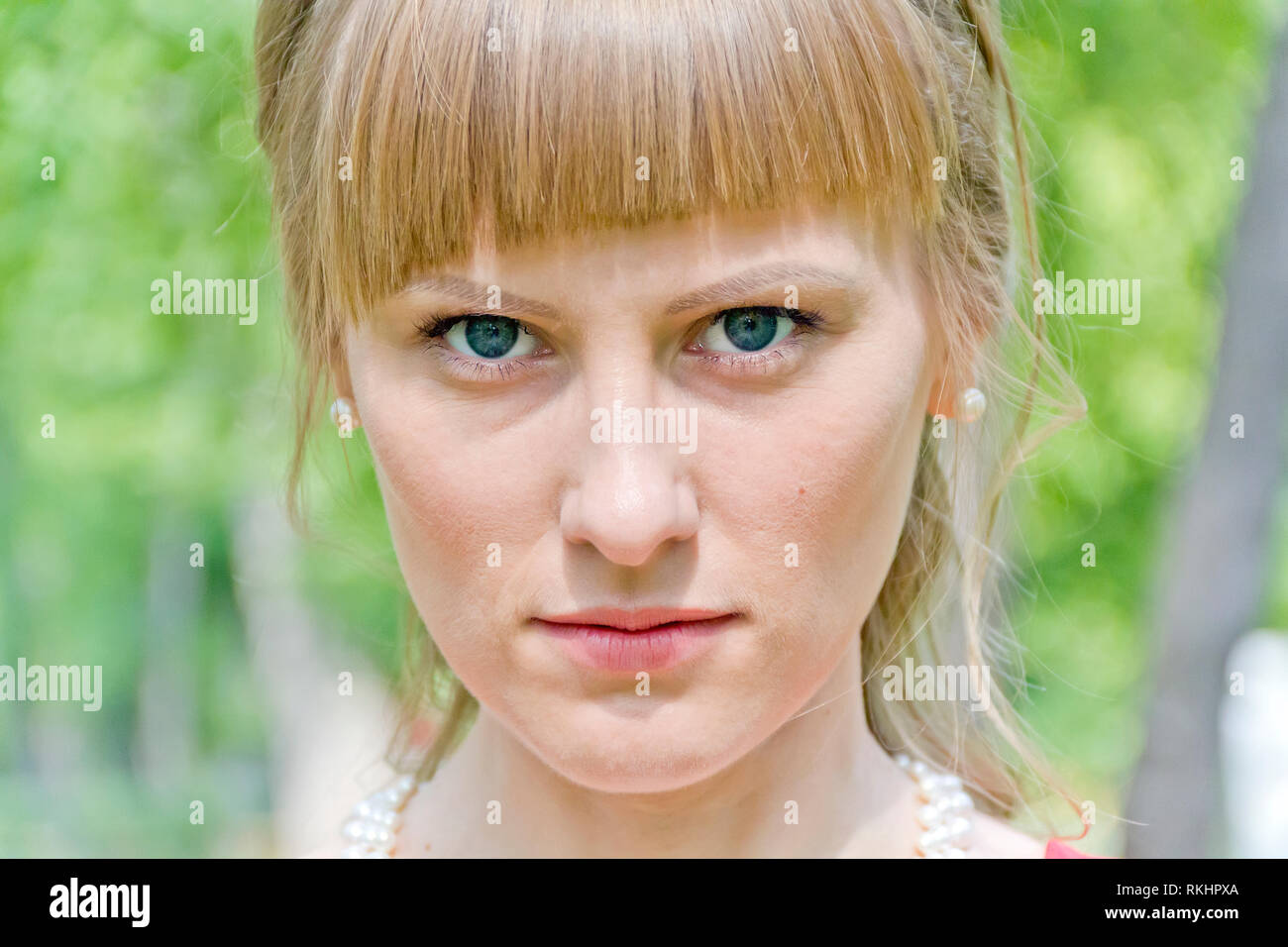 Horizontal portrait of girl with blond hair and big blue eyes Stock ...