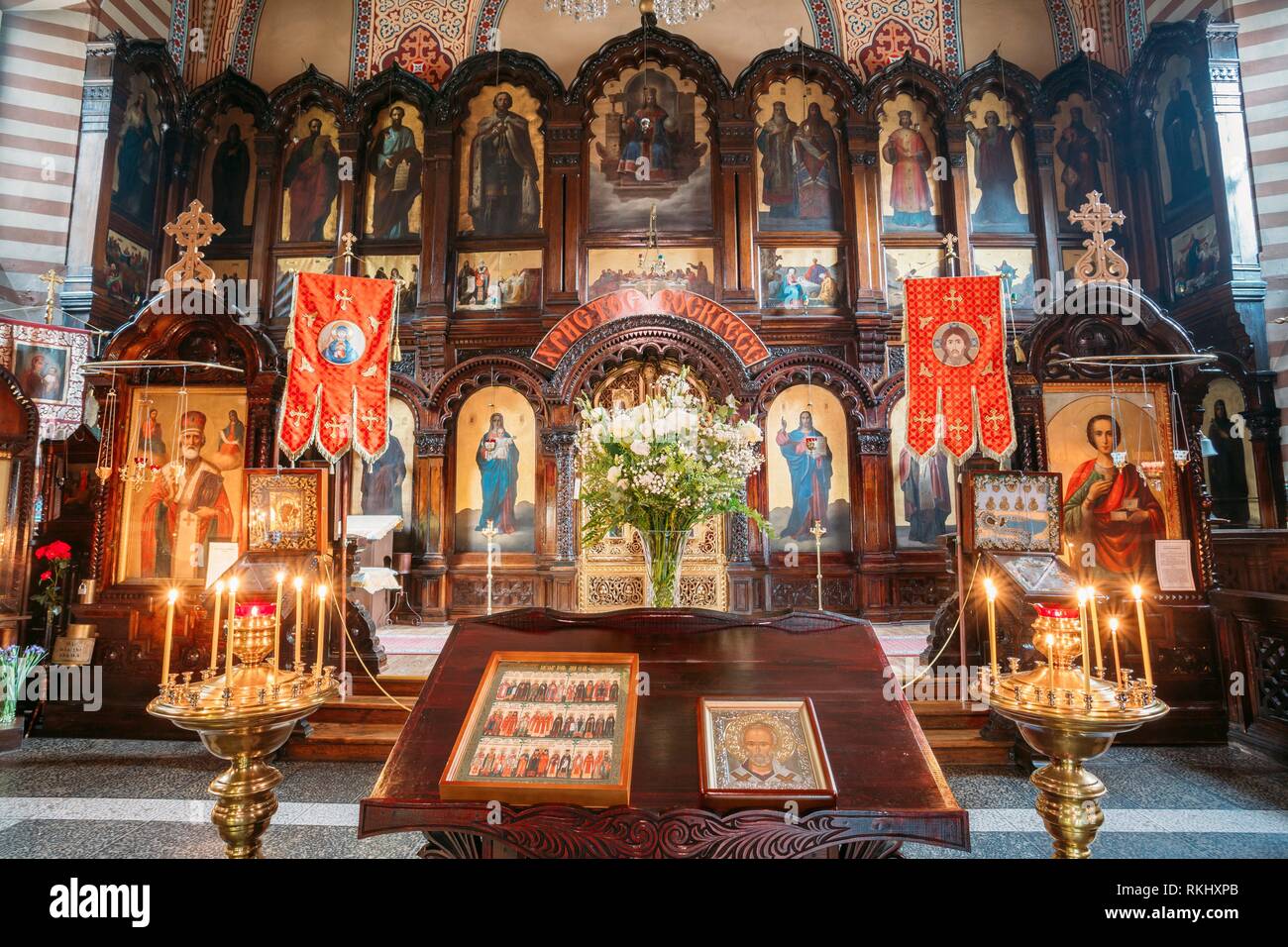 Vilnius, Lithuania: The Lectern Or Analogion With Two Icons Placed For Veneration By The Faithful In Orthodox Church Of St. Nicholas. Stock Photo