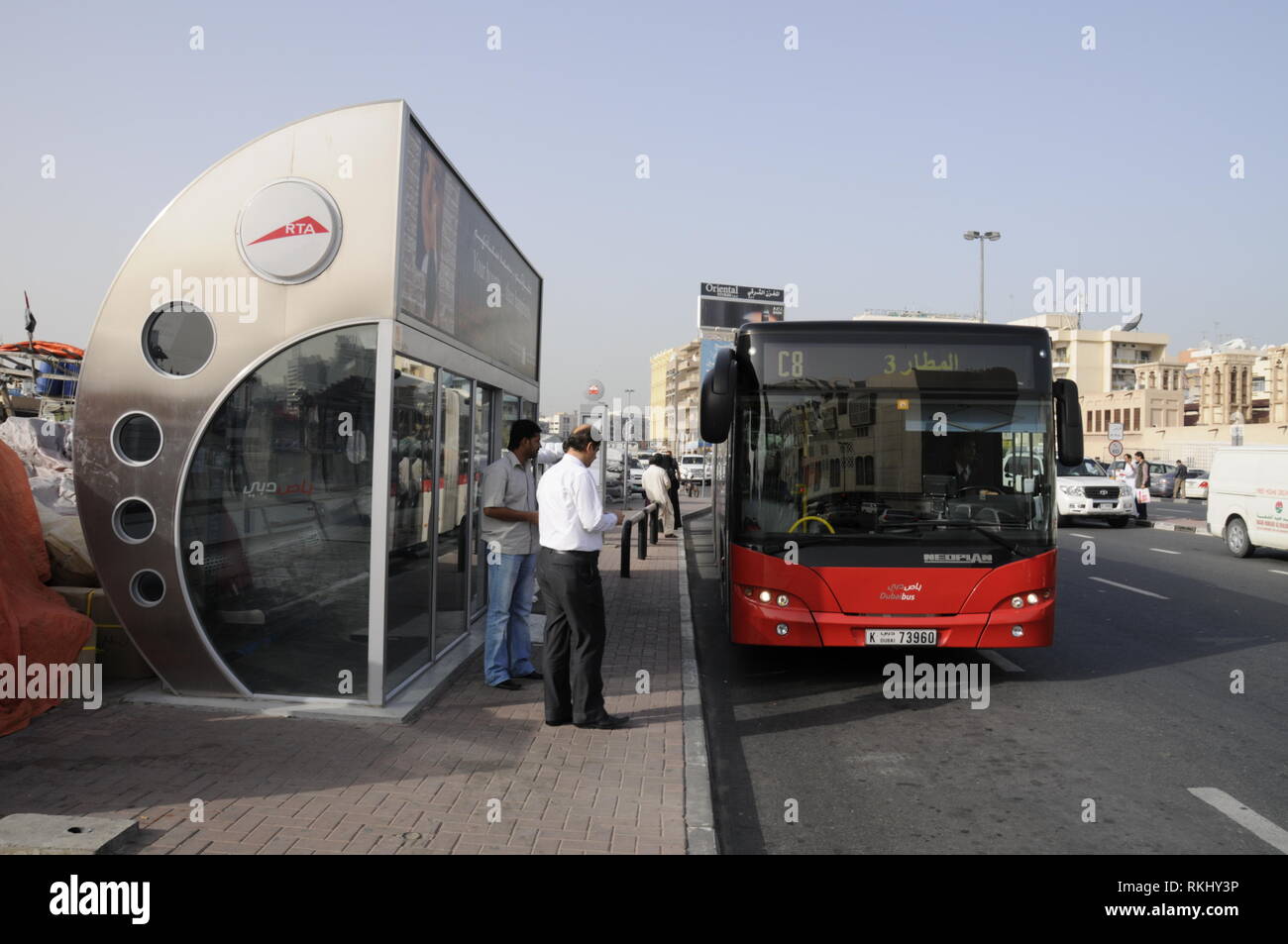 A bus approaching an aircondition bus stop in Dubai in the United Arab