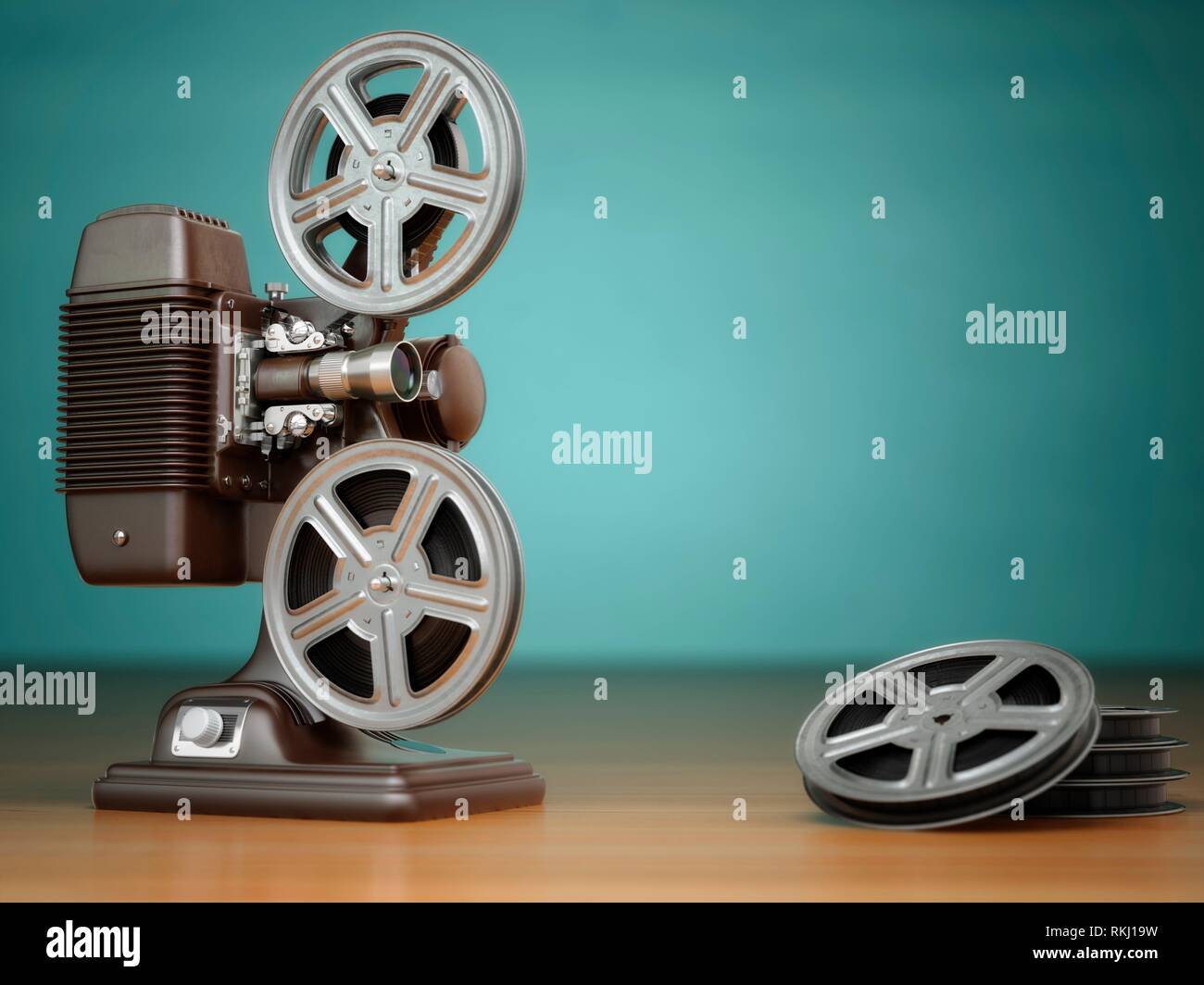 Video, cinema concept. Vintage film movie projector and reels on green