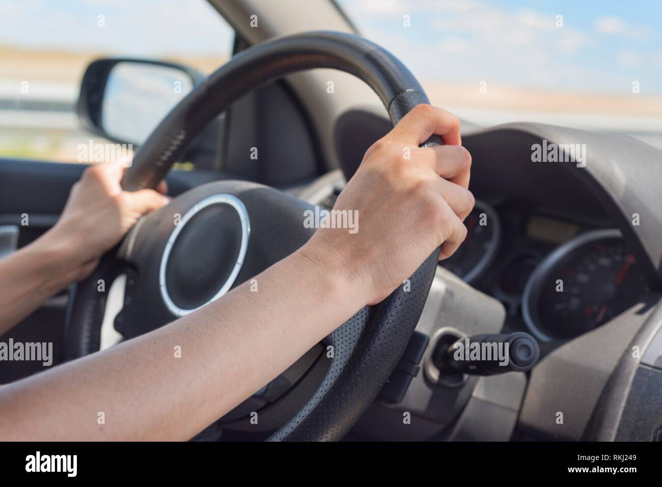 Female hands on steering wheel hi-res stock photography and images - Alamy