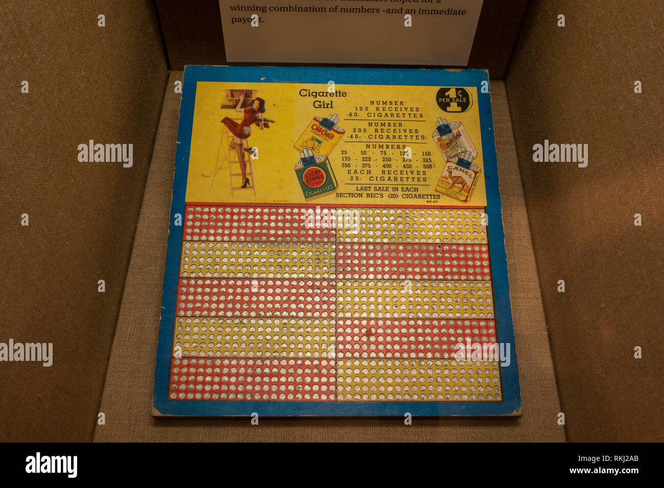 A Cigarette Girl punchboard, used for lotteries, The Mob Museum, Las Vegas (City of Las Vegas), Nevada, United States. Stock Photo