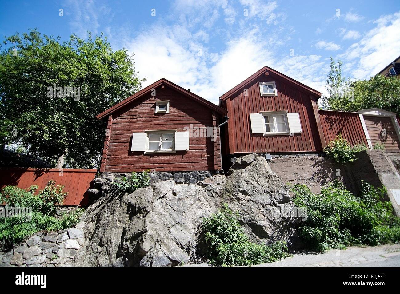 STOCKHOLM, SWEDEN JULY 11, 2018 Old red wood homes in hills of