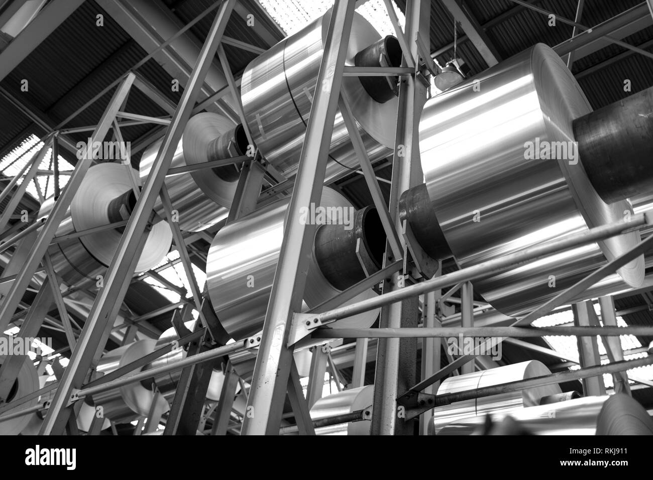 Four different roll of aluminum foil for food storage and cooking, isolated  image on white background. Foil rolls of different size: length and thickn  Stock Photo - Alamy