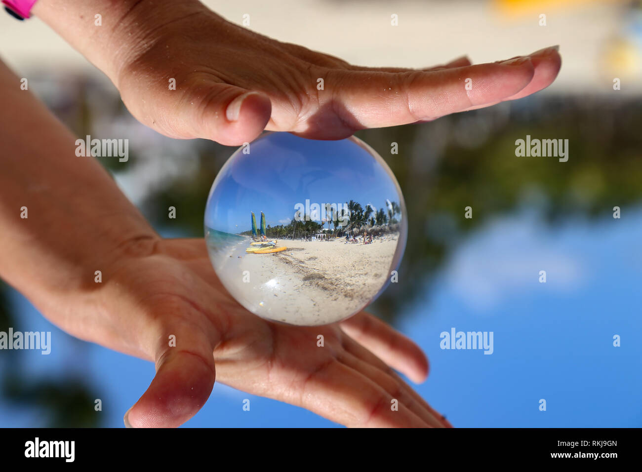 Glass ball. Beach through a glass ball Stock Photo Alamy