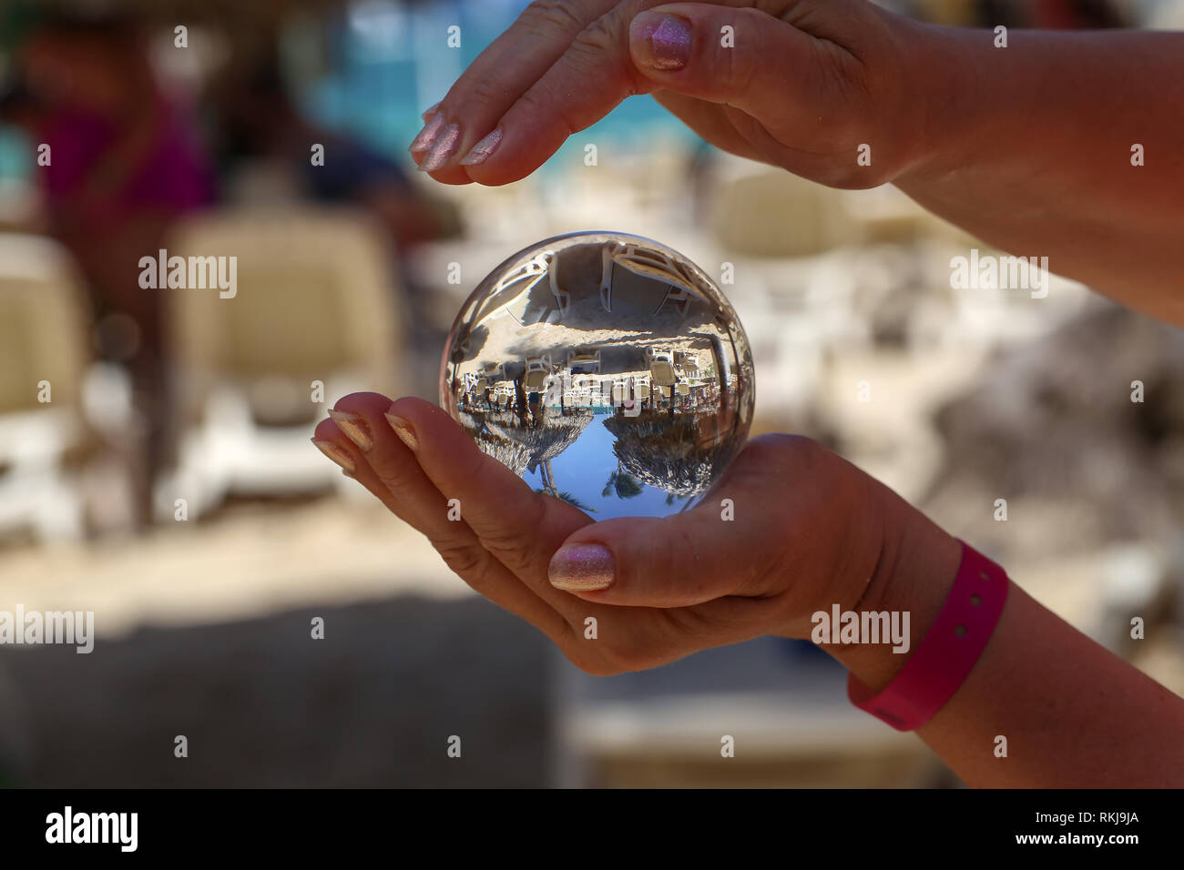 Glass ball. Beach through a glass ball Stock Photo Alamy