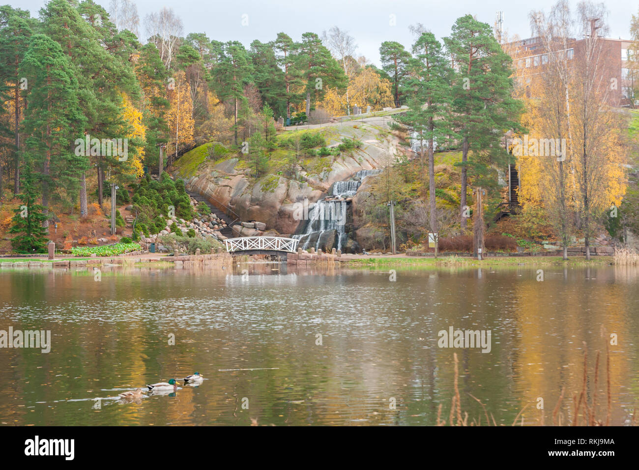 Waterfall cascading over rocks in Sapokka landscaping park Kotka, Finland. Stock Photo