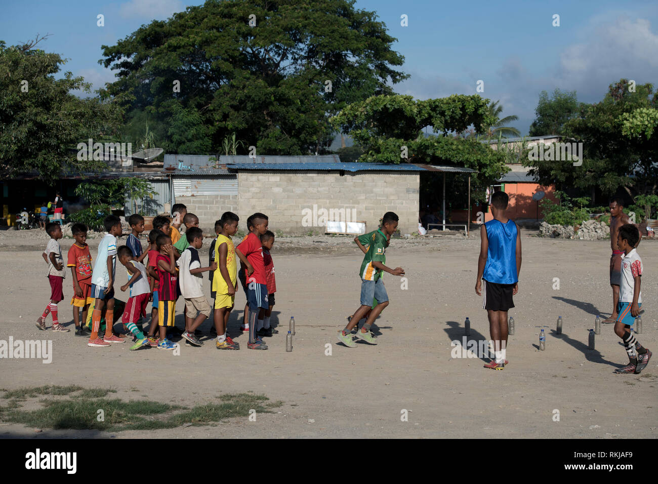 Football Practice, Kids practicing football skills, Dili, East Timor Stock Photo