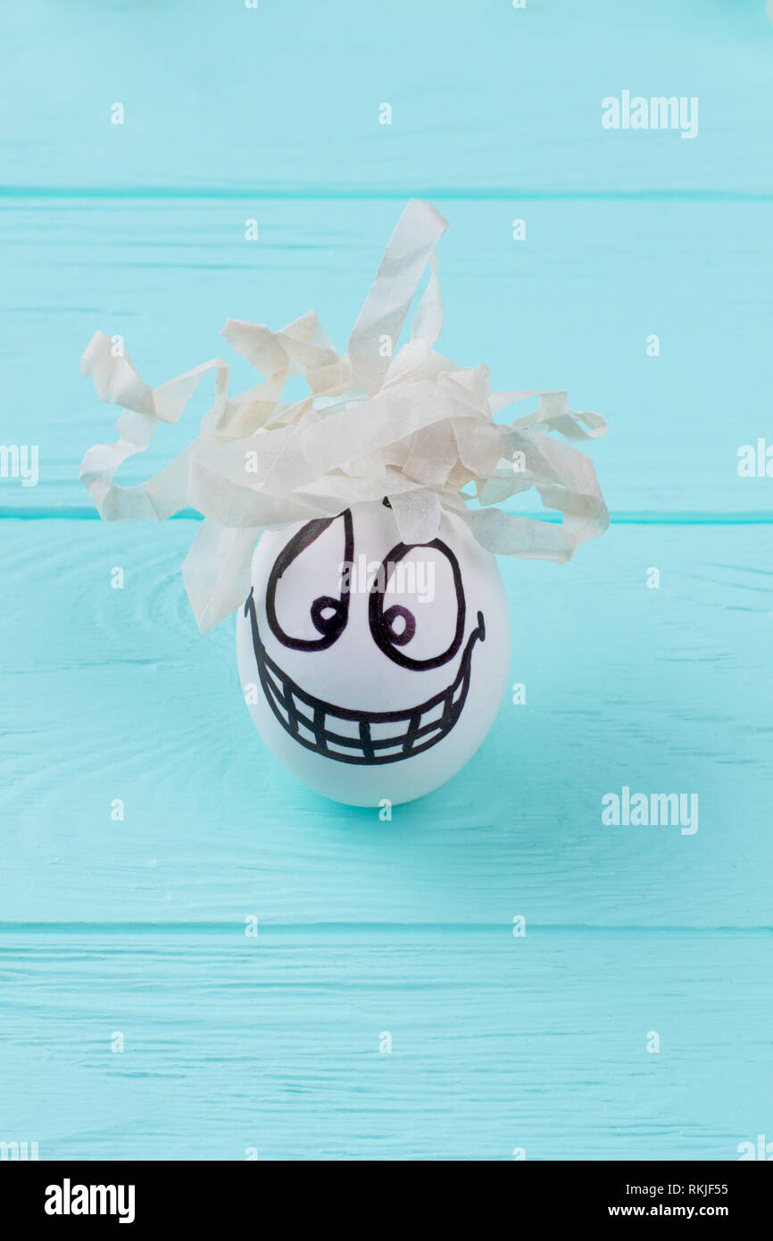 White egg with funny face Stock Photo Alamy