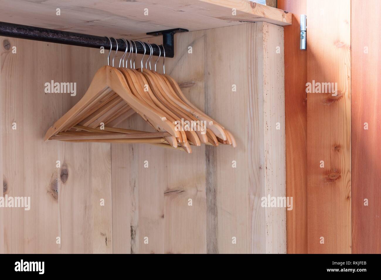 Clothes hangers next to the front door Stock Photo Alamy