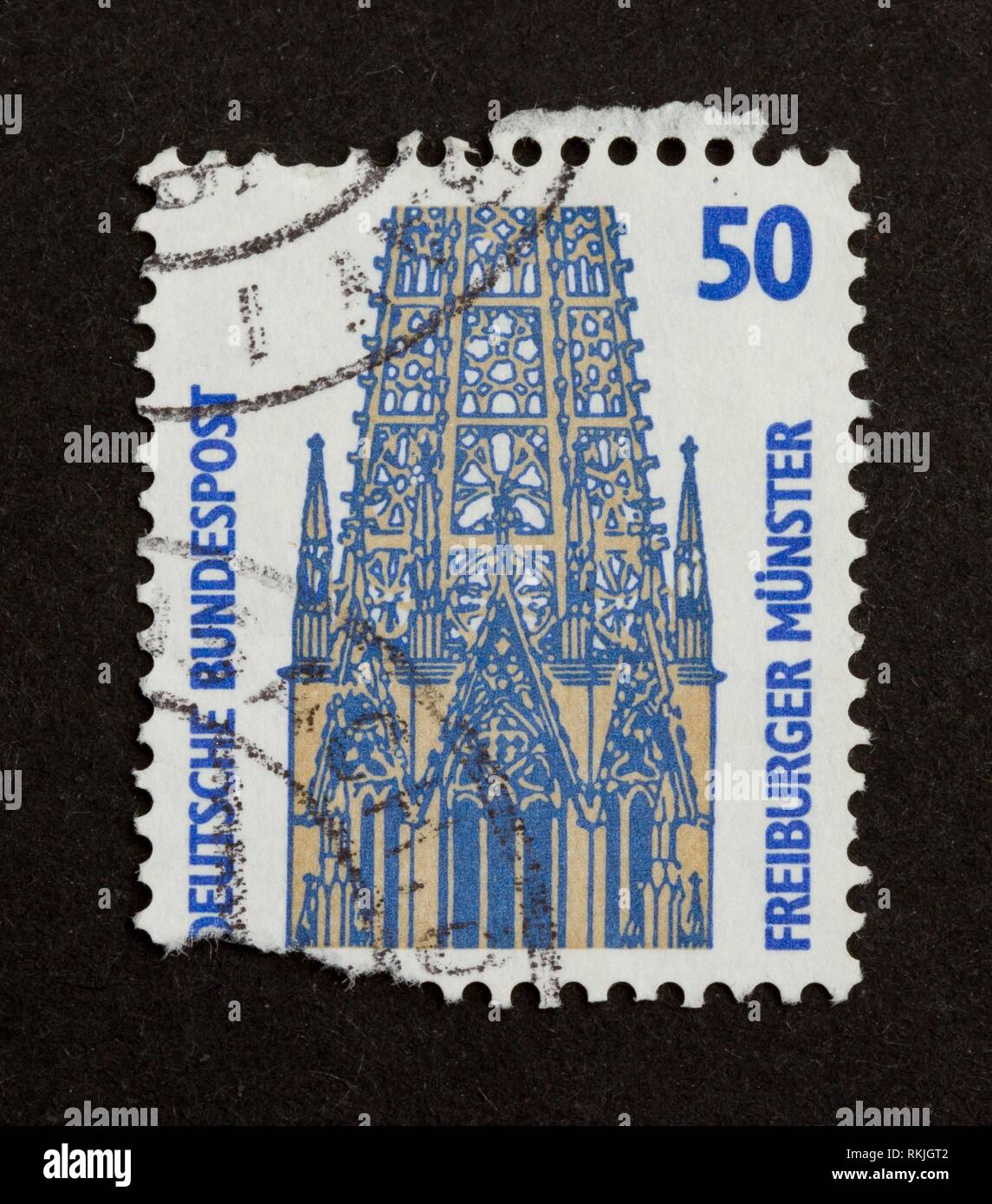 GERMANY - CIRCA 1980: Stamp printed in Germany shows the Freiburger Münster, circa 1980. Stock Photo