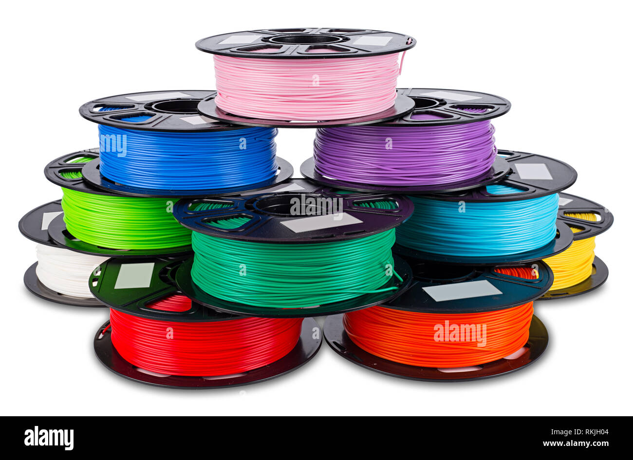 colorful bright stack pile of spool 3d printer pla abs filament plastic material isolated on white background Stock Photo