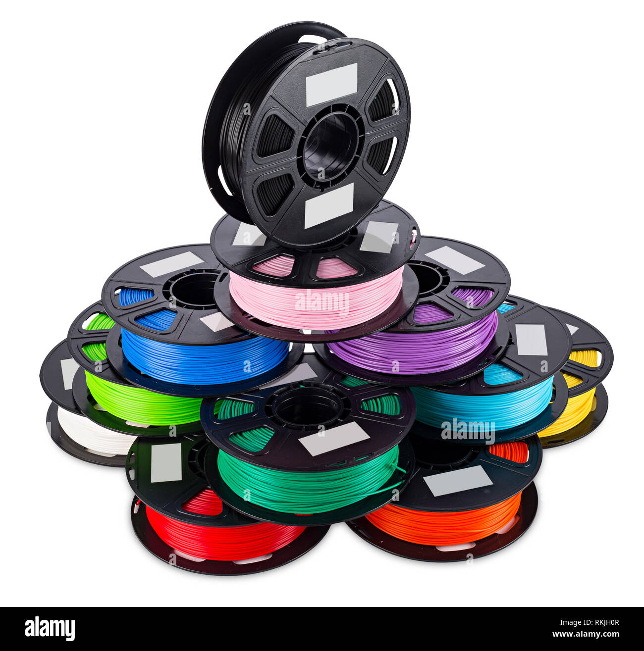 colorful bright stack pile of spool 3d printer pla abs filament plastic material isolated on white background Stock Photo