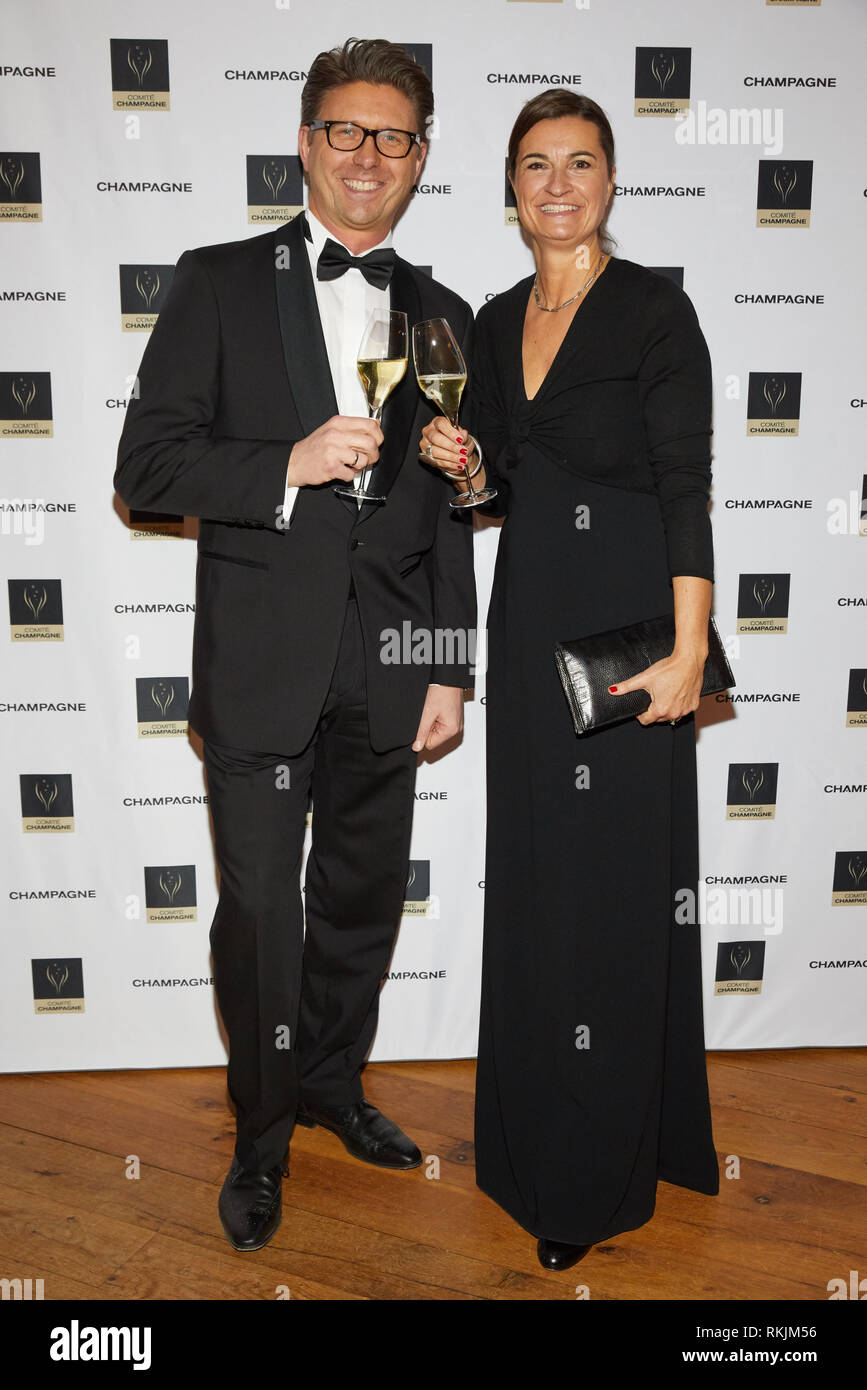 Hamburg, Germany. 11th Feb, 2019. Inka Schneider, journalist, and Andre  Aue, managing director of DSR Hotel Holding, come to the presentation of  the Champagne Prize for Joie de Vivre to the musician
