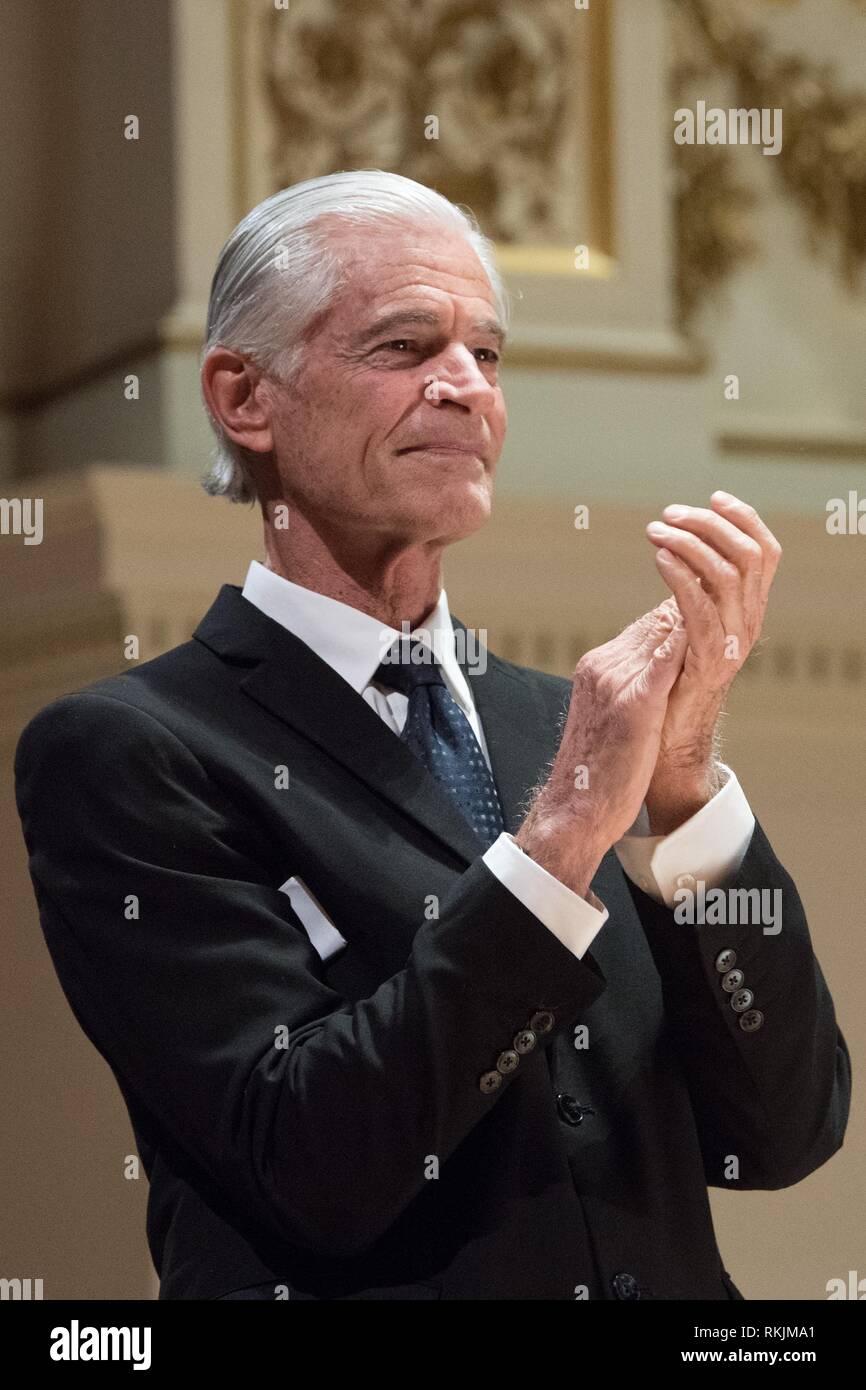 Dresden, Germany. 11th Feb, 2019. The US-American photographer James Nachtwey, laudator for the prize, applauds on the occasion of the awarding of the 10th International Peace Prize in the Semper Opera House. The prize is endowed with 10,000 euros and was awarded to the Vietnamese Kim Phuc Phan Thi. Credit: Sebastian Kahnert/dpa-Zentralbild/dpa/Alamy Live News Stock Photo
